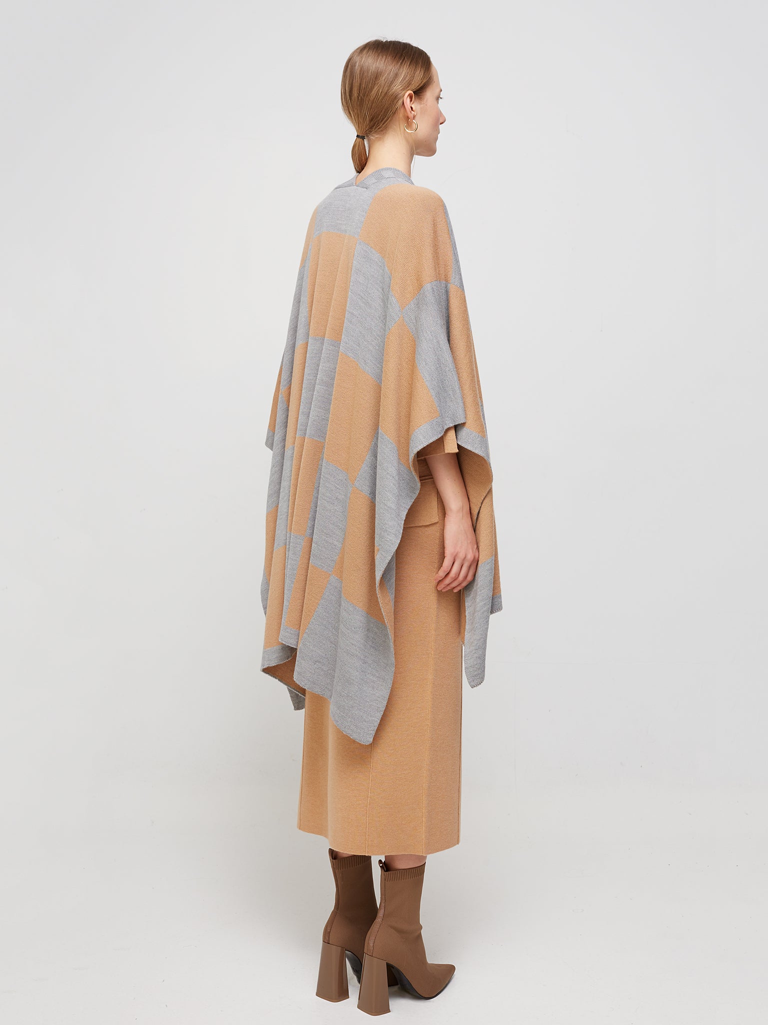 Poncho jaquard tubular