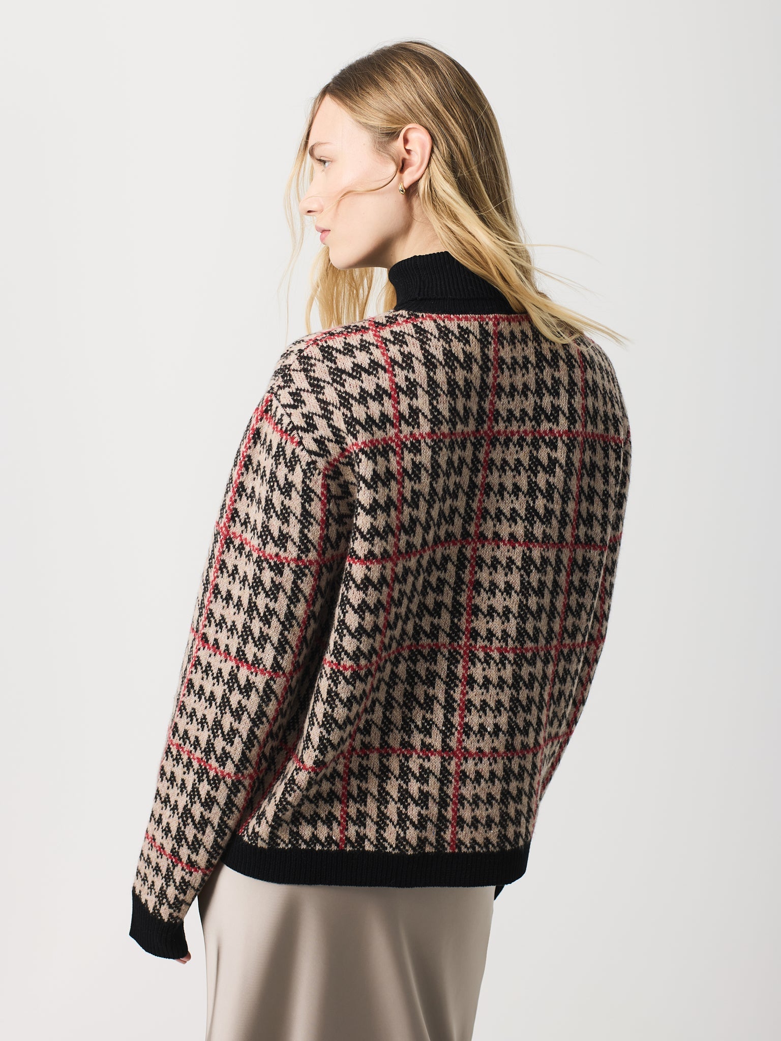 Jersei jacqard a quadres coll alt