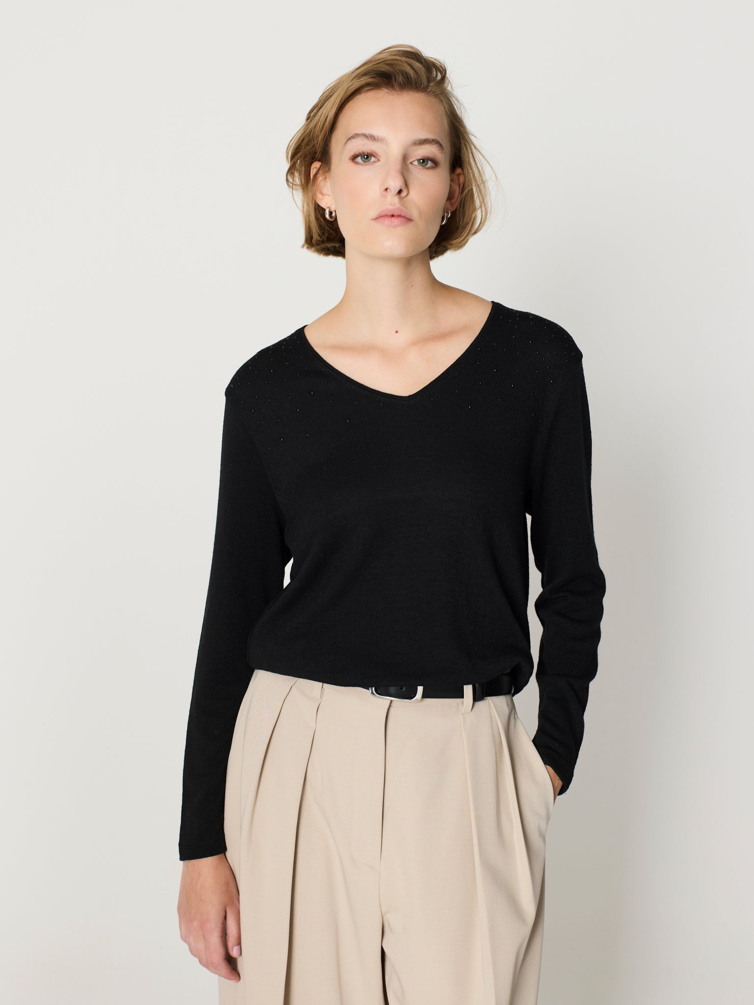 Camiseta con piedras brillantes